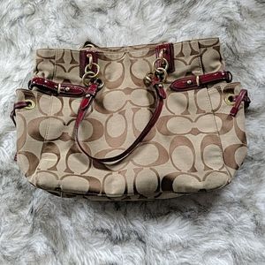 Coach logo handbag with red accents